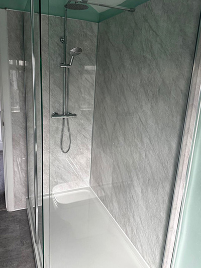 Rain shower head with additional shower attachment